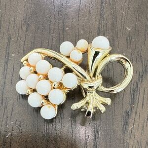 Elegant Gold and Cream Brooch